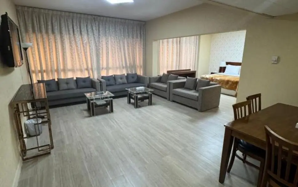 Spacious one-bedroom apartment with separate living area and full kitchen